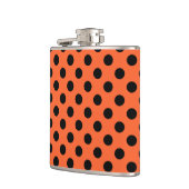 Zwarte haarpunten op oranje heupfles (Links)