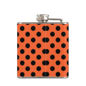 Zwarte haarpunten op oranje heupfles (Achterkant)