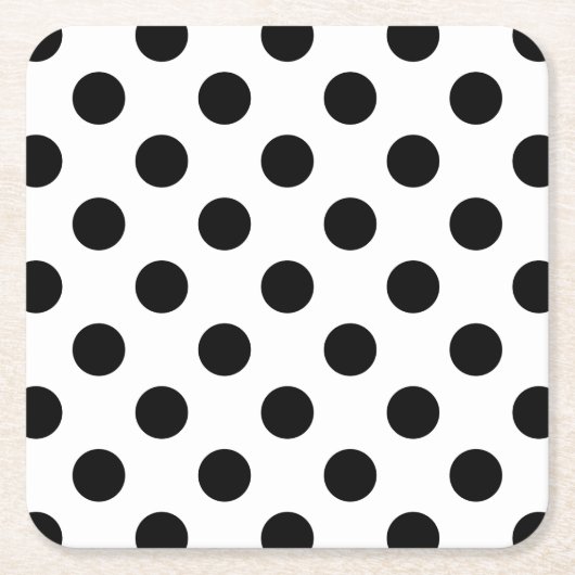Zwarte haarpunten op wit kartonnen onderzetters (Voorkant)