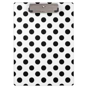 Zwarte haarpunten op wit klembord