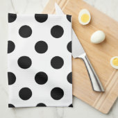 Zwarte haarpunten op wit theedoek (Quarter Fold)