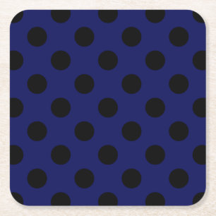 Zwarte haarstaartstippen op blauw kartonnen onderzetters