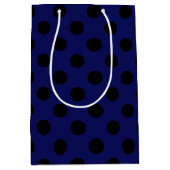 Zwarte haarstaartstippen op blauw medium cadeauzakje (Voorkant)