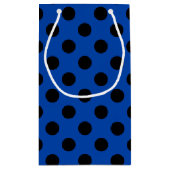 Zwarte haarvlekken op koningsblauw klein cadeauzakje (Achterkant)