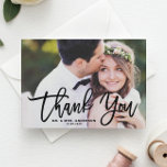 Zwarte Hand Lettering Moderne foto bruiloft Bedankkaart<br><div class="desc">Druk uw dankbaarheid uit met onze aanpasbare foto bruiloft bedankkaart, met elegante moderne kalligrafie. Dit ontwerp combineert naadloos persoonlijk sentiment met hedendaagse stijl, waardoor het de perfecte manier is om uw gasten te bedanken voor het delen van uw speciale dag. Laat je favoriete trouwfoto's zien en voeg een persoonlijk tintje...</div>
