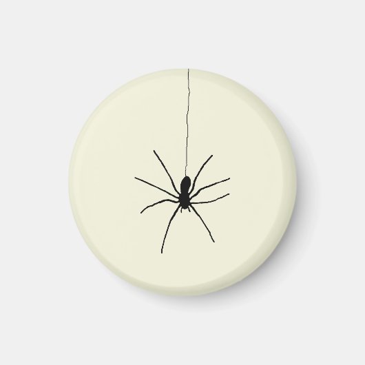 Zwarte hangende spin op beige (off white) kleur magneet (Voorkant)