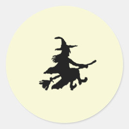 Zwarte heks op geel ronde sticker
