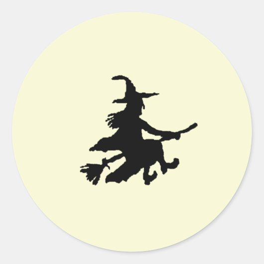 Zwarte heks op geel ronde sticker (Voorkant)