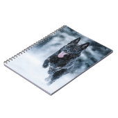 Zwarte herder in het Hoesje van de sneeuwdekooter Notitieboek (Linkerzijde)