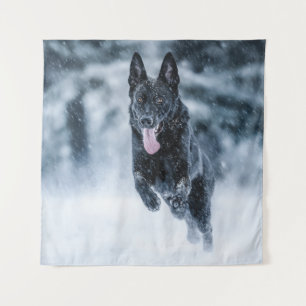 Zwarte herder in het Hoesje van de sneeuwdekooter Wandkleed