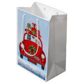 zwarte herderhond in auto met kerstman medium cadeauzakje (Achterkant Gekanteld)