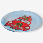 zwarte herderhond in auto met kerstman papieren bordje (Gekanteld)