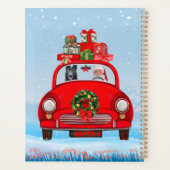 zwarte herderhond in auto met kerstman planner (Achterkant)