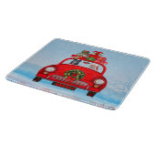 zwarte herderhond in auto met kerstman snijplank (Hoek)