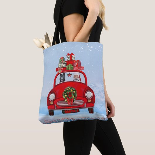 zwarte herderhond in auto met kerstman tote bag (Dichtbij)