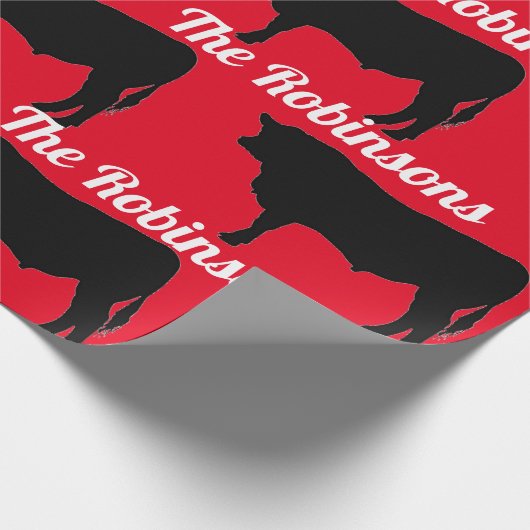 Zwarte hoekstiften op rood omslagpapier cadeaupapier (Hoek)