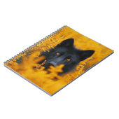 Zwarte hond met prachtige gouden ogen notitieboek (Linkerzijde)