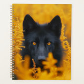 Zwarte hond met prachtige gouden ogen planner (Voorkant)