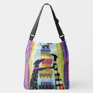 Zwarte honden die een toren van boeken in evenwich crossbody tas