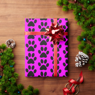 Zwarte honden/katten/dierenpootafdrukken op roze cadeaupapier