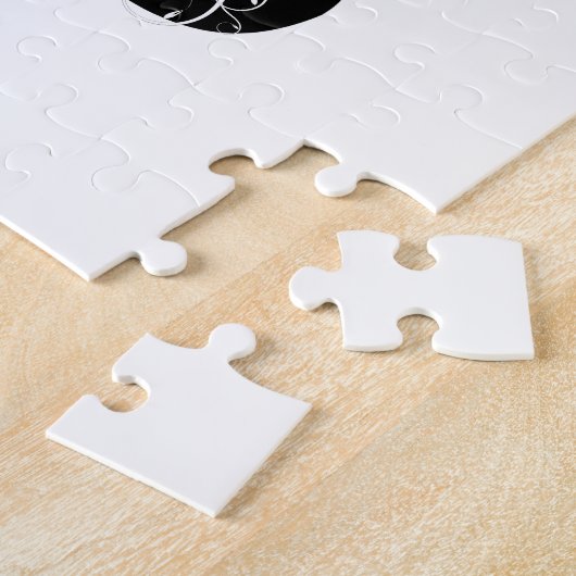 Zwarte hondenpootafdruk met witte krullen legpuzzel (Zijkant)