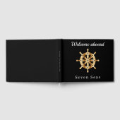 Zwarte jachtboot naam gouden stuurwiel gastenboek (Volledig)