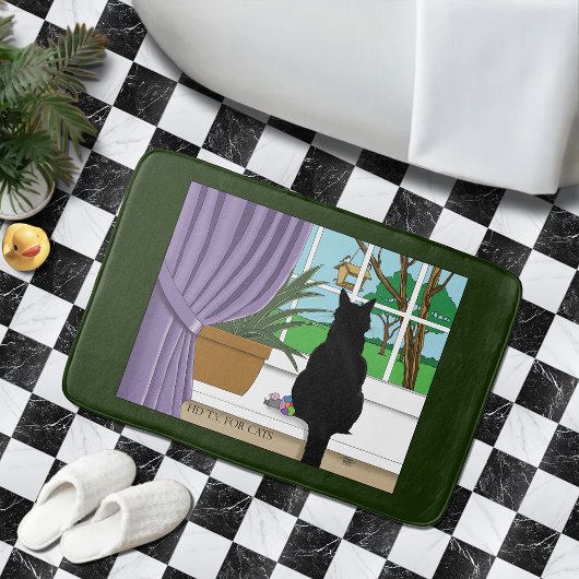 Zwarte kat die uit venster kijkt badmat