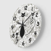 Zwarte kat en Kittens in zwarte en witte tuin Grote Klok (Hoek)