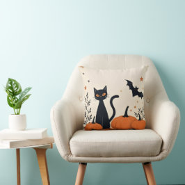 ZWARTE KAT EN POMPOENEN KUSSEN