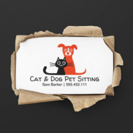 Zwarte kat en rode hond huisdier zitten | Dierenve Visitekaartje