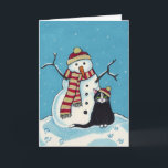Zwarte kat en Snowman-kerstkaart Feestdagen Kaart<br><div class="desc">Kute kerstkaart voor kattenliefhebbers met een schilderij van Lisa Marie Robinson. Een zwarte en witte kat zit naast een sneeuwman. De sneeuwman heeft een wortelneus en draagt een pet en sjaal. De kat draagt een pet. Copyright © Lisa Marie Robinson. Alle rechten voorbehouden.</div>