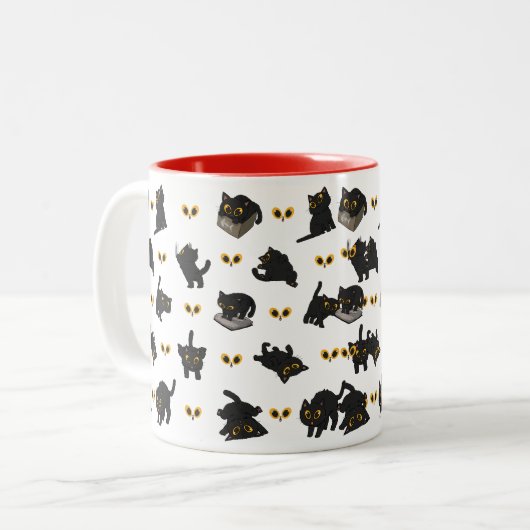 ZWARTE KAT HOUDING TWEEKLEURIGE KOFFIEMOK (Voorkant links)