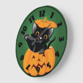 Zwarte kat in een pompoenkast grote klok (Hoek)