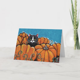 Zwarte kat in Halloween pompoen patch Kaart