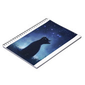 Zwarte kat in magische sterrenweide notitieboek (Linkerzijde)