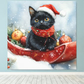 Zwarte kat in slee laat het sneeuwen Kerstmis Canvas Afdruk (Insitu (Houten vloer))