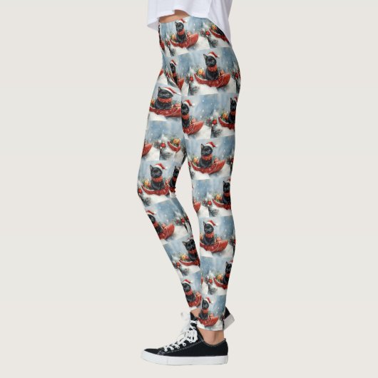 Zwarte kat in slee laat het sneeuwen Kerstmis Leggings (Links)