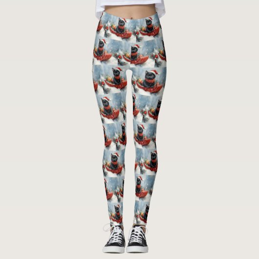 Zwarte kat in slee laat het sneeuwen Kerstmis Leggings (Voorkant)
