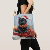 Zwarte kat in slee laat het sneeuwen Kerstmis Tote Bag (Dichtbij)
