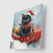 Zwarte kat in slee laat het sneeuwen Kerstmis Vierkante Klok (Hoek)