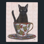 Zwarte kat in Teacup Puzzel<br><div class="desc">Zwarte kat in Teacup door FabFunky. Kenmerkt een kat die in een mooie florale theepot zit. | 191544D</div>