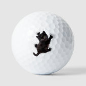 Zwarte kat klimmen op menselijke rug golfballen (Voorkant)