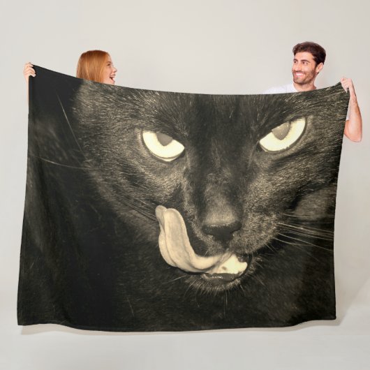 Zwarte kat likken fleece deken (In situ)
