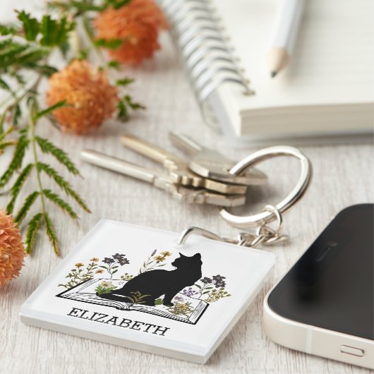 Zwarte kat met bloemenboek sleutelhanger (Voorkant Rechts)