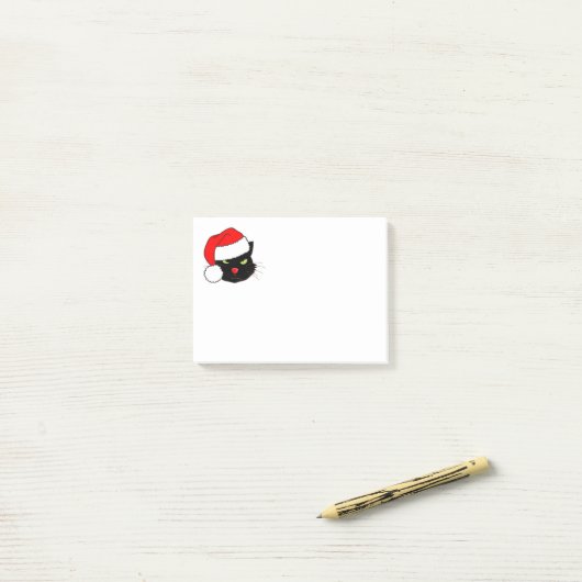 Zwarte kat met een Santa Hat Post-it® Notes (Op bureau)