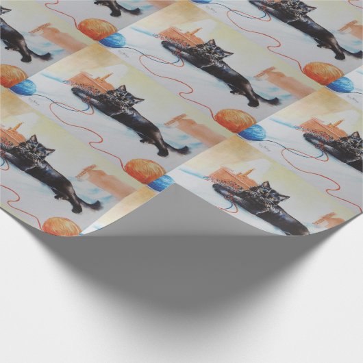 Zwarte kat met garen cadeaupapier (Hoek)