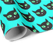 Zwarte kat met groene ogen op turquoise blauw cadeaupapier (Rol Hoek)