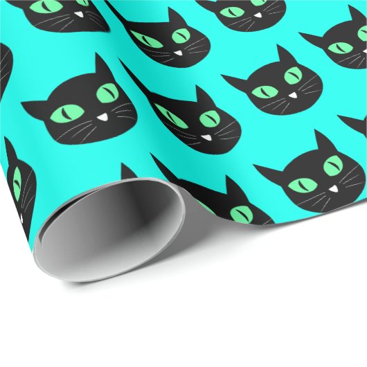 Zwarte kat met groene ogen op turquoise blauw cadeaupapier (Rol Hoek)