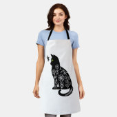 Zwarte kat met groene ogen schort (Gedragen)