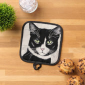 Zwarte kat met kat-itude pannenlap (Top down)